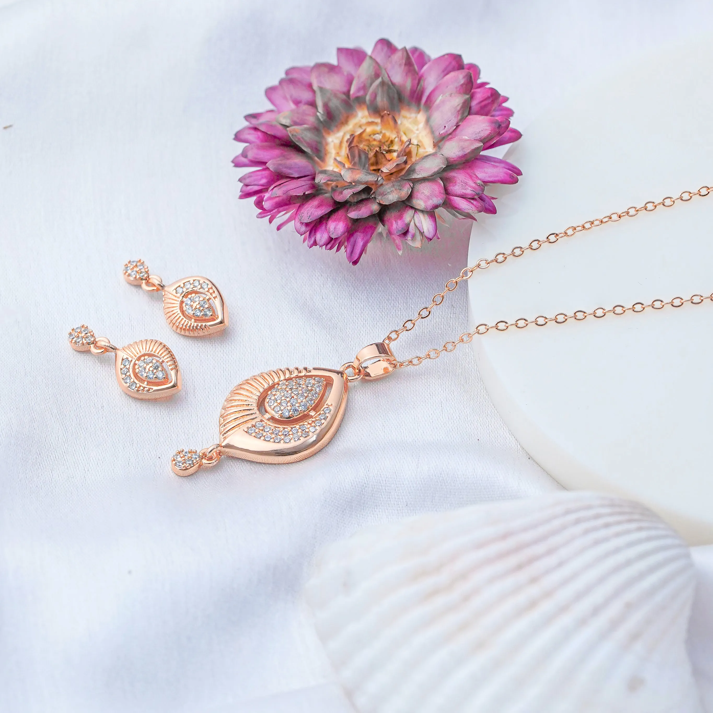 Redefined
Zarder Rose Gold Designer Chain Pendant Set: Effortless Luxury for Every Occasion